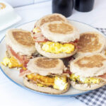 Plate stacked with homemade breakfast sandwiches