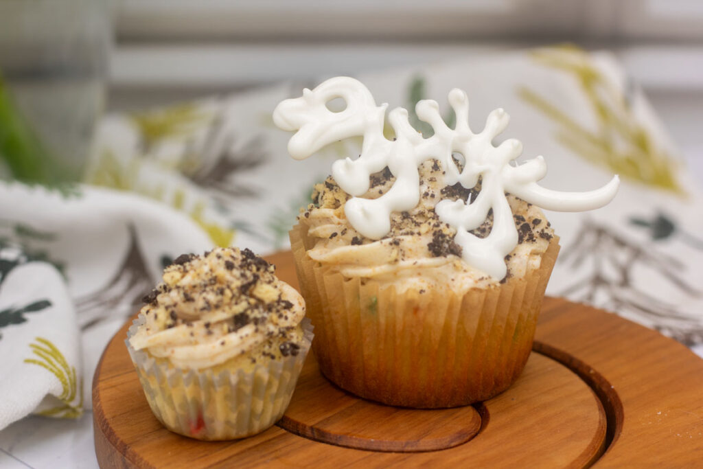 Spinosaurus cupcake with brown butter icing