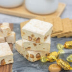 Caramel crunch marshmallows and Werther's caramels on a stone board