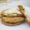Close up of stuffed carrot cake cookies with icing