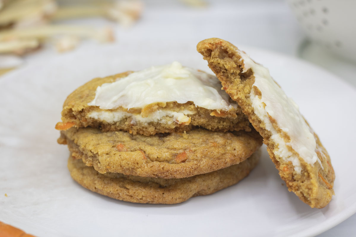 Close up of stuffed carrot cake cookies with icing