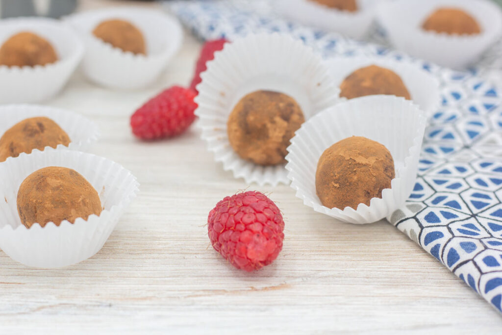 Hand rolled raspberry chambord truffles