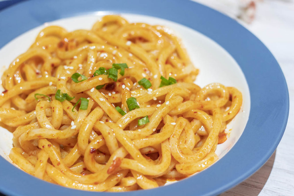 close up of chili crisp udon noodles