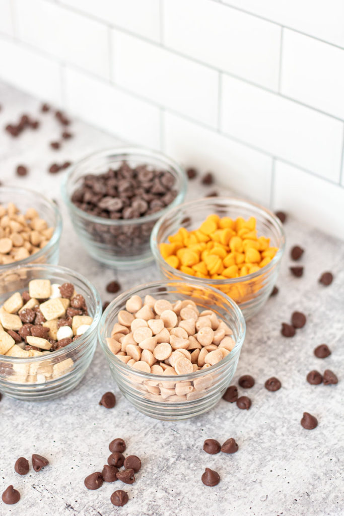 Five different specialty chocolate chip flavors in bowls