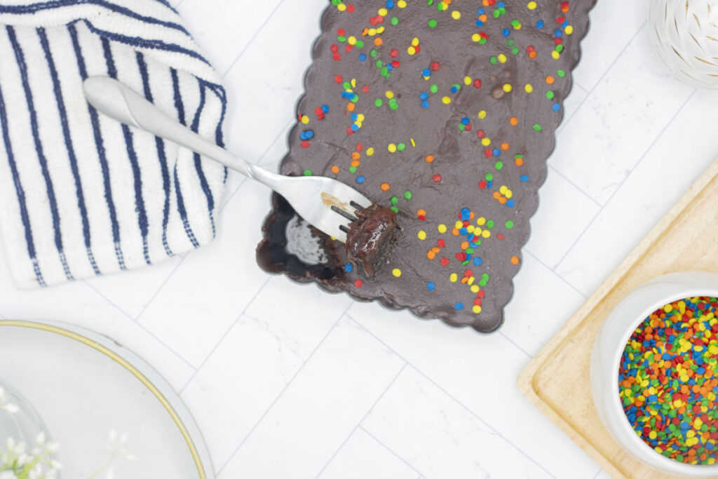 Fork grabbing a bite of no-bake chocolate tart