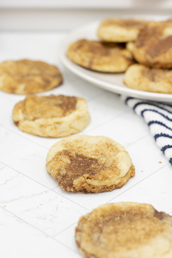 Cinnamon roll snickerdoodles lined up in a diagonal line