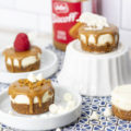 Variously decorated white chocolate biscoff cheesecakes