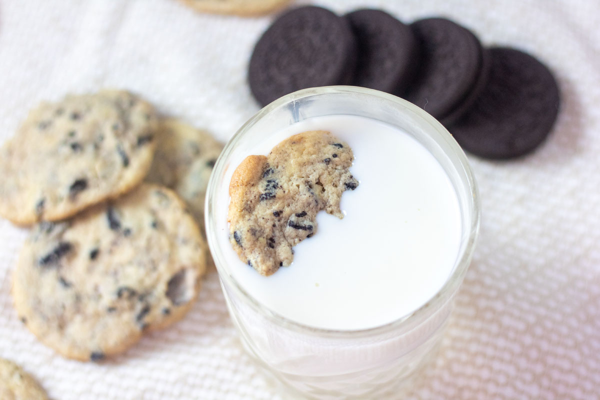 cookies and cream cookies in a glass of milk