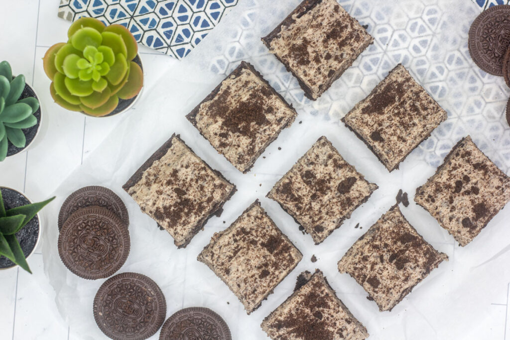 Assorted cookies and cream brownies topped with crushed oreo cookies