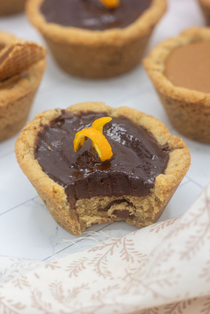 Deep dish cookie cup topped with an orange citris peel curl