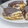 Slice of bake chocolate eclair icebox cake