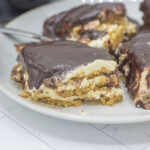 Slice of bake chocolate eclair icebox cake