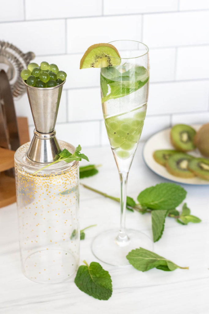frog spawn cocktail with mint leaves and kiwi