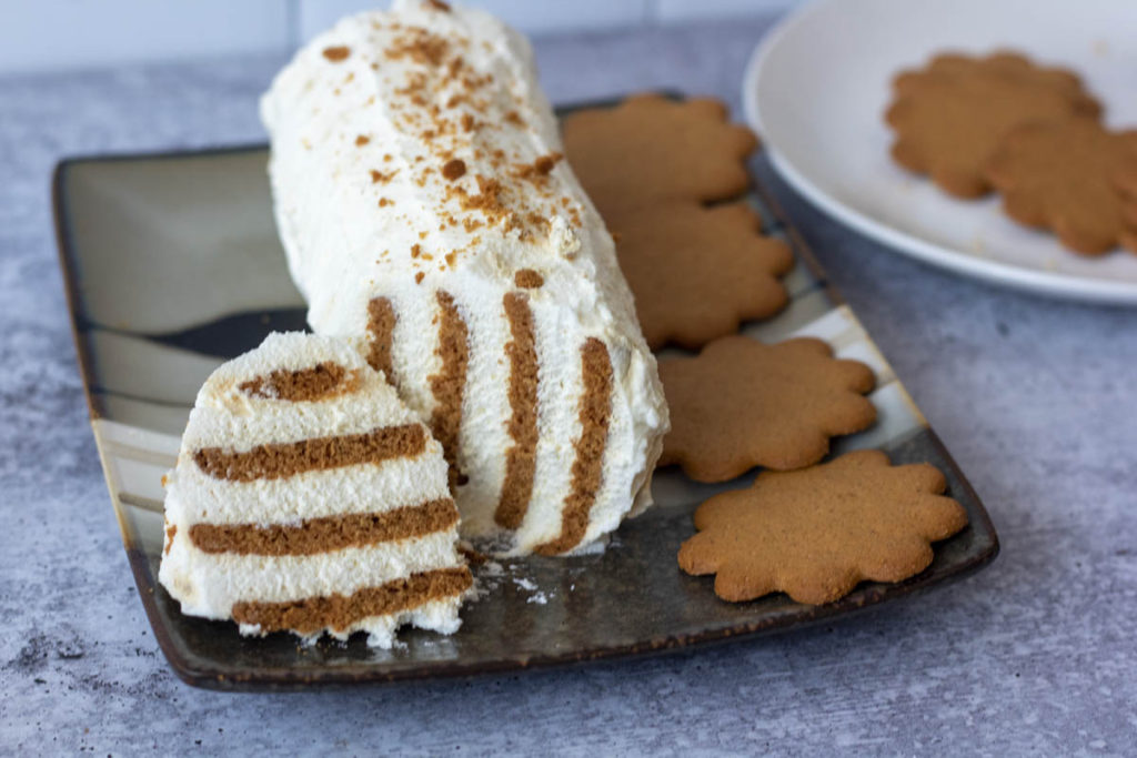 gingerbread icebox cake with cookies on a plate