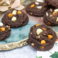 Halloween mash cookies with pumpkin spice chips, white chocolate chips, and macadamia nuts