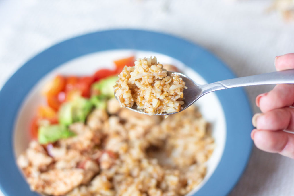 harissa bulgur rice pilaf on a fork