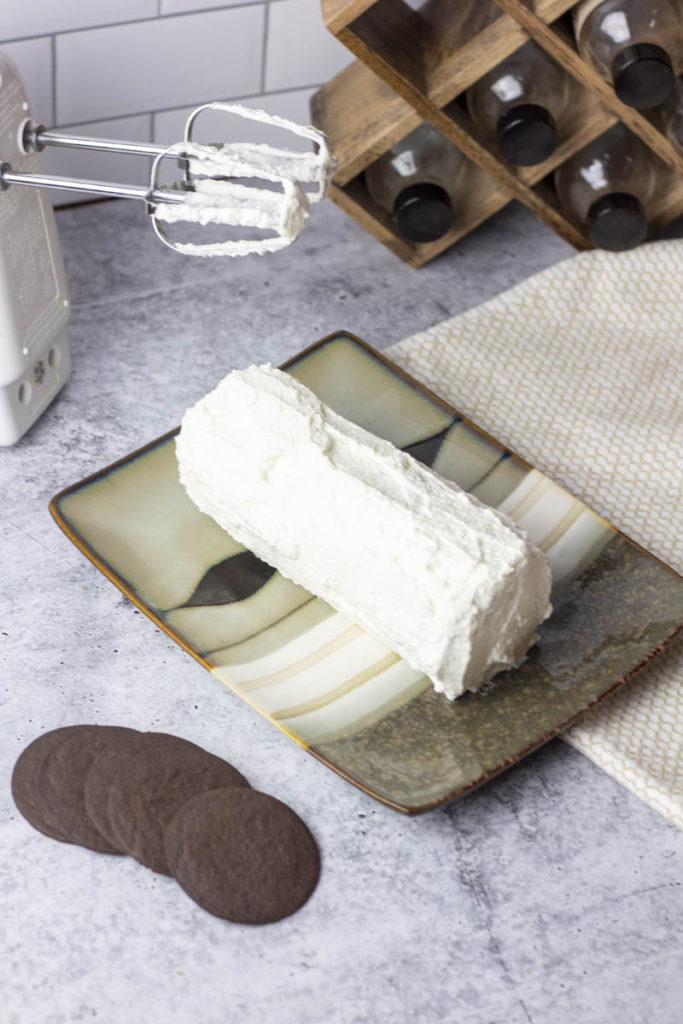 icebox cake freshly coated with whipped cream