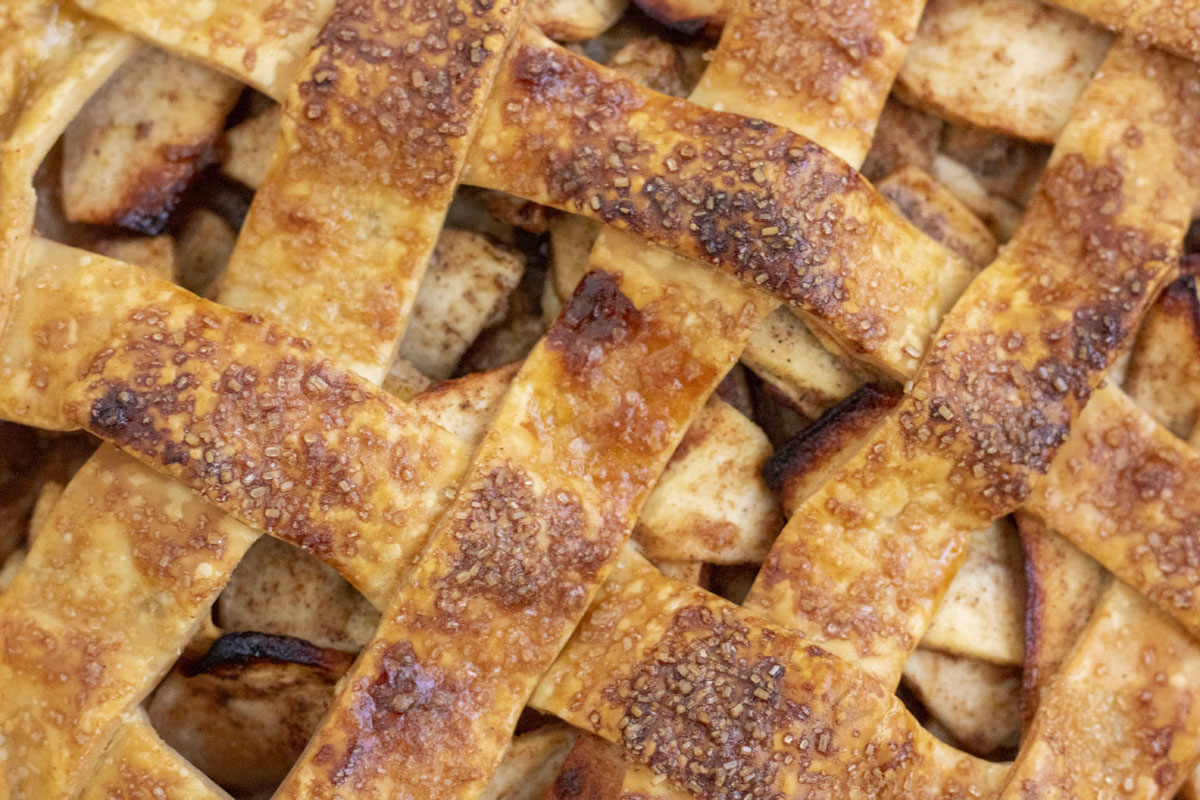 Close up of the lattice crust on lattice apple pie