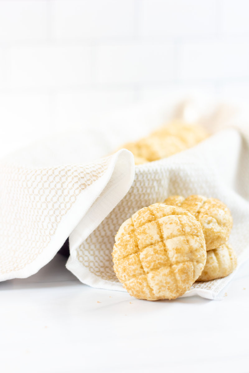 Close up of melon pan with a basket in the background