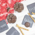 top down view of peppermint patties scattered amongst festive coasters
