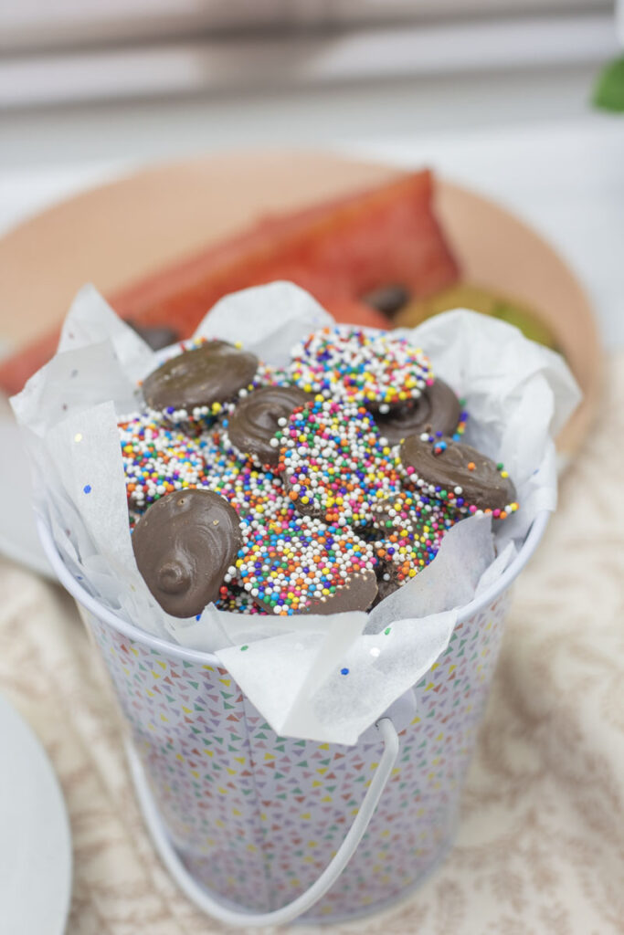 A festive bucket of chocolate nonpareils