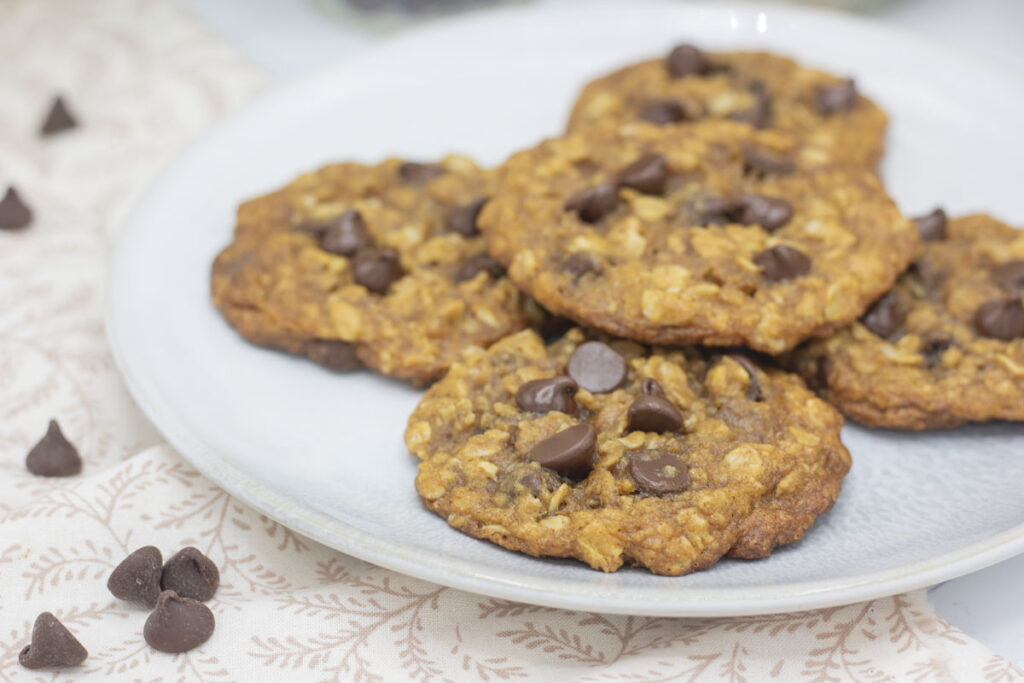 Oatmeal chocolate chip cookies piled on a plate