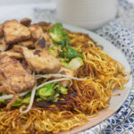 Plate of noodles with chicken and vegetables