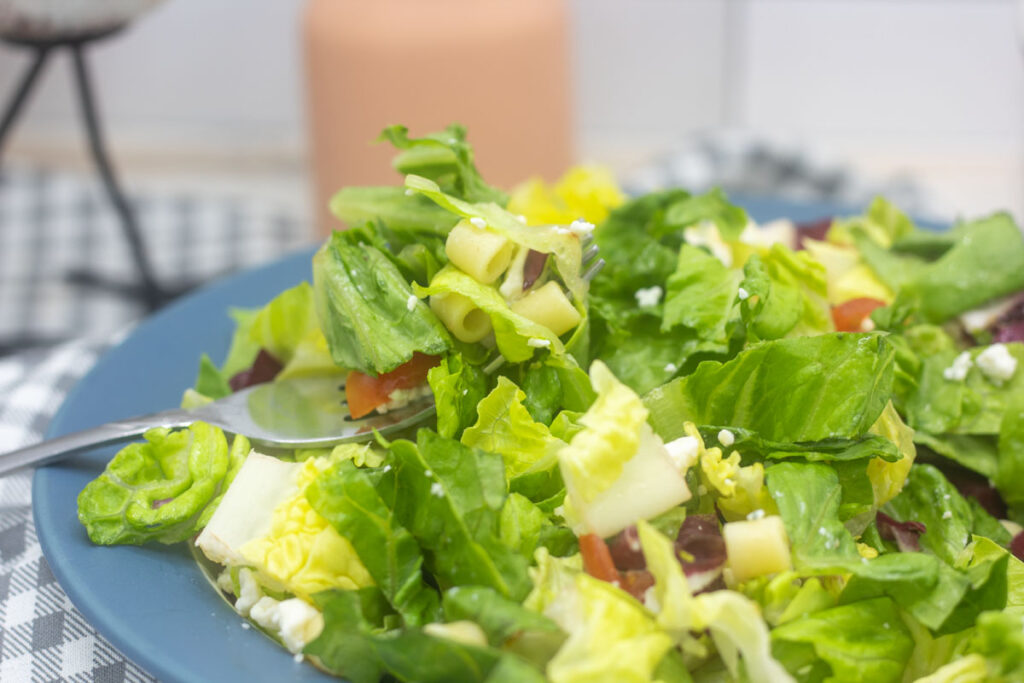 Fork spearing portillos chopped salad