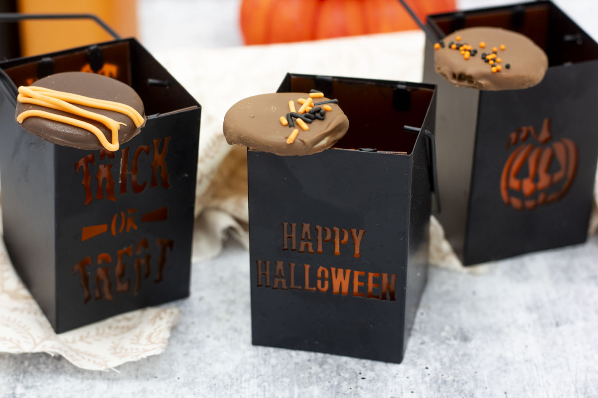 Pumpkin spice patties perched on halloween decor