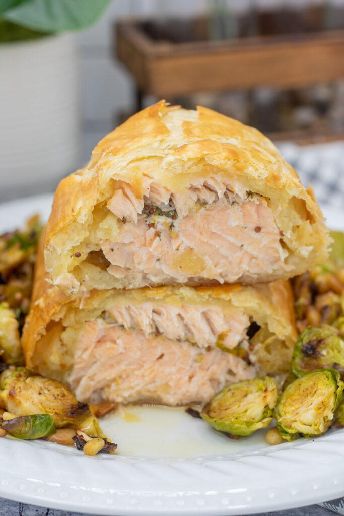 Salmon en croute cut and stacked to see the salmon layers