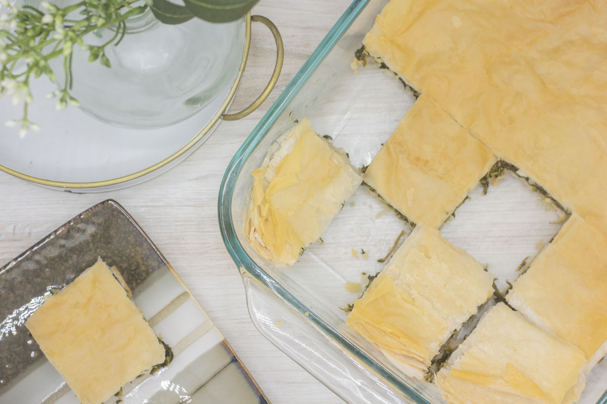 Serving dish of spanakopita spinach pie