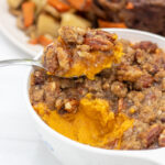 Heaping spoonful of sweet potato souffle