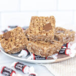 Tootsie roll rice krispie treats stacked on a plate