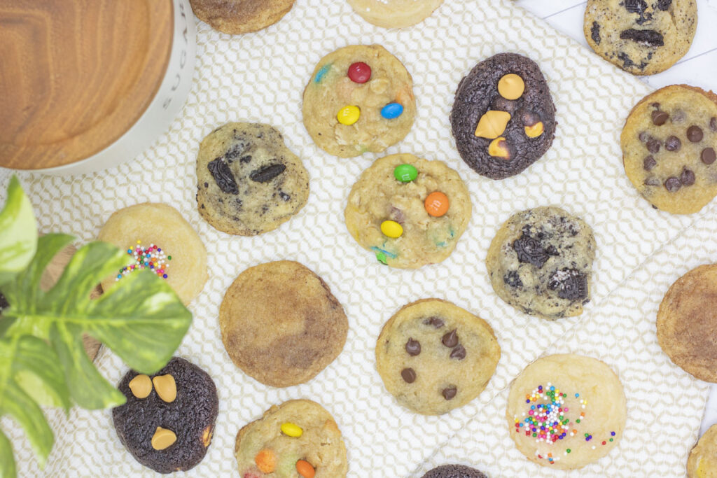 Various cookie flavors scattered, all made from the same ultimate cookie dough