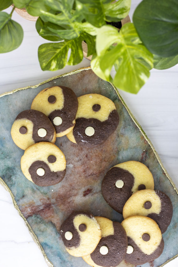 Yinyang cookie assortment arranged on a board